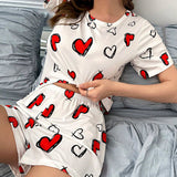 Conjunto de pijama shorts con camiConjuntoa con estampado de corazon