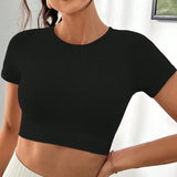 Daily&Casual Camiseta deportiva corta negra con corte en la espalda - Top corto para el Gimnasio