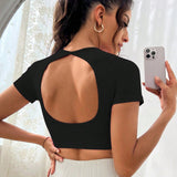 Daily&Casual Camiseta deportiva corta negra con corte en la espalda - Top corto para el Gimnasio