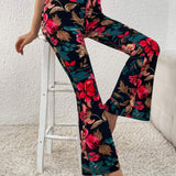 Prive Pantalones acampanados con estampado floral