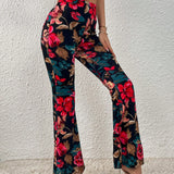 Prive Pantalones acampanados con estampado floral