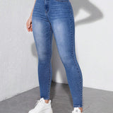 Jeans ajustados de e alto