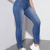 Jeans ajustados de e alto