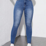 Jeans ajustados de e alto