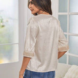 Blusa de lunares jacquard con encaje de manga farol de saten