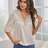 Blusa de lunares jacquard con encaje de manga farol de saten