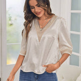 Blusa de lunares jacquard con encaje de manga farol de saten