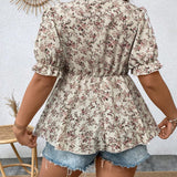 Prive a grande Blusa peplum con estampado floral de manga farol