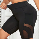 Yoga Sxy Pantalones cortos de ciclista de talla grande con malla de contraste y bolsillo para telefono, pantalones cortos ajustados