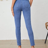LUNE Jeans ajustados bajo con abertura