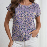 LUNE Blusa con estampado floral de manga murcielago