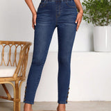 LUNE Jeans ajustados de talle alto con diseno de boton