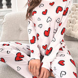 Conjunto de pijama pantalones con camiConjuntoa con estampado de corazon