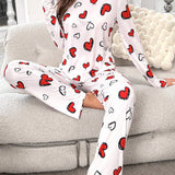 Conjunto de pijama pantalones con camiConjuntoa con estampado de corazon