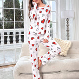 Conjunto de pijama pantalones con camiConjuntoa con estampado de corazon