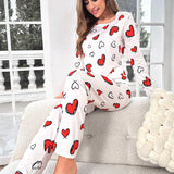 Conjunto de pijama pantalones con camiConjuntoa con estampado de corazon