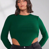 a grande Camiseta crop unicolor bajo asimetrico