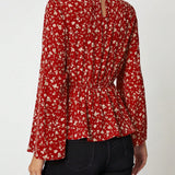 Clasi Blusa peplum con estampado floral de manga con volante