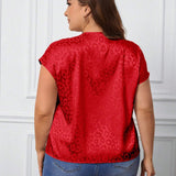 a grande Blusa de leopardo jacquard de manga murcielago