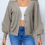 Tall Cardigan con botones y hombros caidos con ribete de flecos