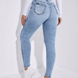 Jeans ajustados desgarro