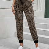 LUNE Pantalones con estampado de leopardo de cintura con cordon