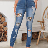 LUNE Jeans ajustados desgarro con estampado de leopardo