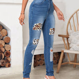 LUNE Jeans ajustados desgarro con estampado de leopardo