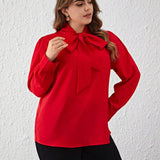 Prive Blusa con mangas abullonadas y cuello anudado