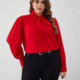 Prive Blusa con mangas abullonadas y cuello anudado