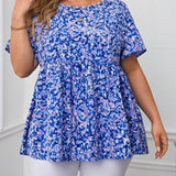 a grande Blusa peplum con estampado