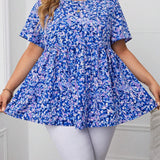 a grande Blusa peplum con estampado