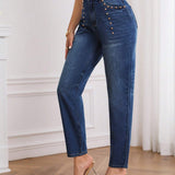 Jeans ajustados de talle alto con diseno de boton