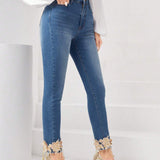 Prive Jeans ajustados con bordado floral aplique