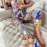 Conjunto de pijama con pantalones y camiConjuntoa con grafico de dibujos animados