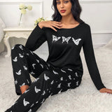 Conjunto de pijama pantalones con camiConjuntoa con estampado de mariposa