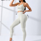 Sport Studio Conjunto deportivo de espalda abierta con tira cruzada de cintura ancha