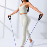 Sport Studio Conjunto deportivo de espalda abierta con tira cruzada de cintura ancha