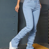ICON Jeans de talle alto fruncido bajo crudo apilado