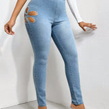 SXY Jeans ajustados con abertura lateral