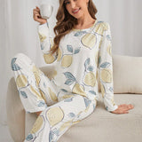 Conjunto de pijama pantalones con camiConjuntoa con estampado de limon