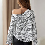 Blusa Con Cuello Asimetrico Y Estampado Completo