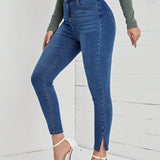 LUNE Jeans ajustados de talle alto bajo con abertura