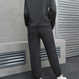 EZwear Pantalones deportivos con sudadera con estampado de letra con cremallera media de hombros caidos