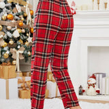 Essnce Pantalones con estampado de tartan cremallera