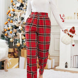 Essnce Pantalones con estampado de tartan cremallera