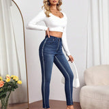 Jeans ajustados con costura lateral en contraste