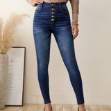 LUNE Jeans ajustados con boton de talle alto