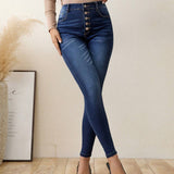 LUNE Jeans ajustados con boton de talle alto