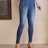 LUNE Jeans ajustados con diamante de imitacion con patron floral